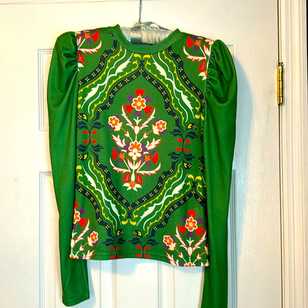 Izuria stretchy mutton sleeve top.
